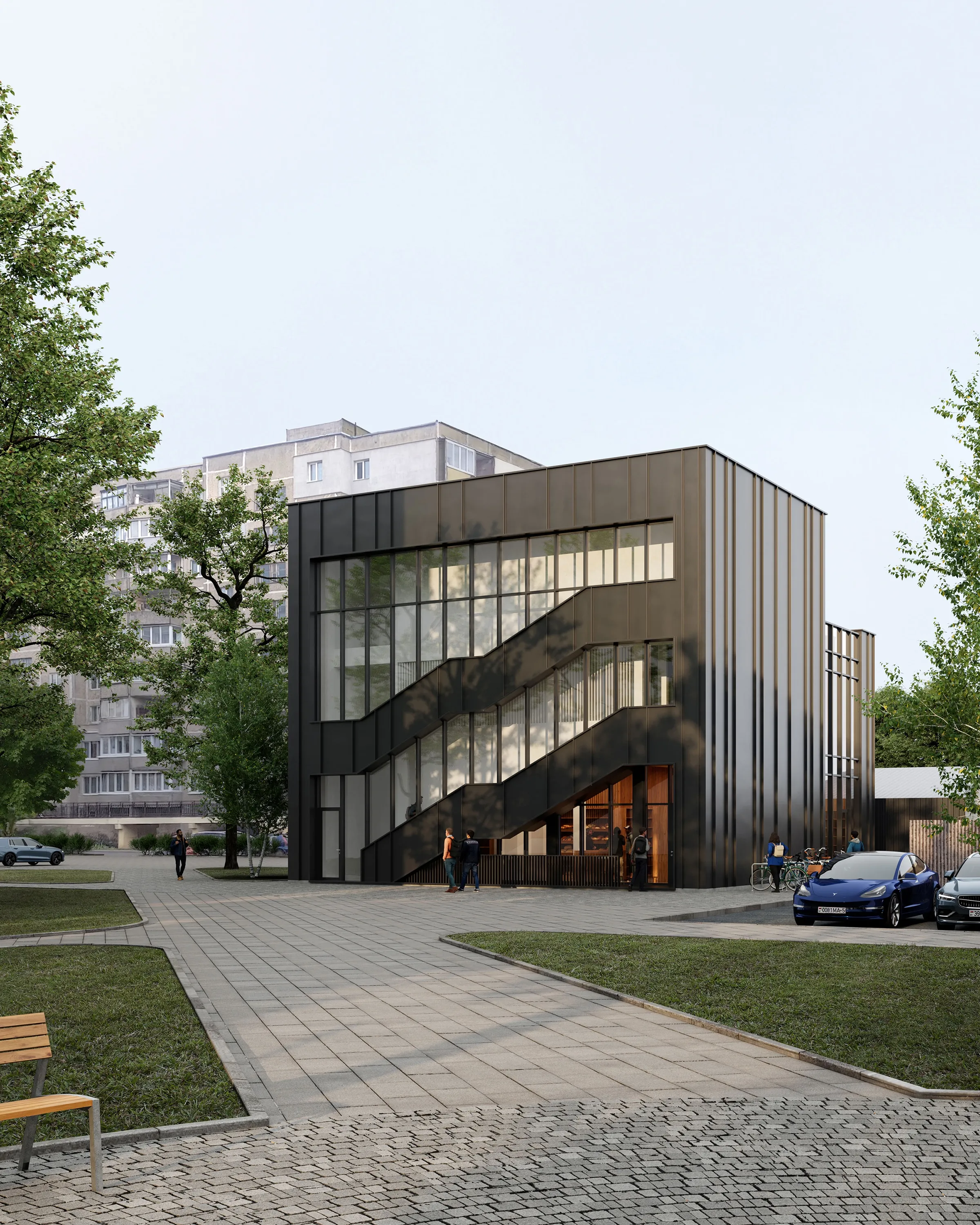 Daytime street view of the Cube building in Borisov, with its glazed stair and ground-floor shopfront.