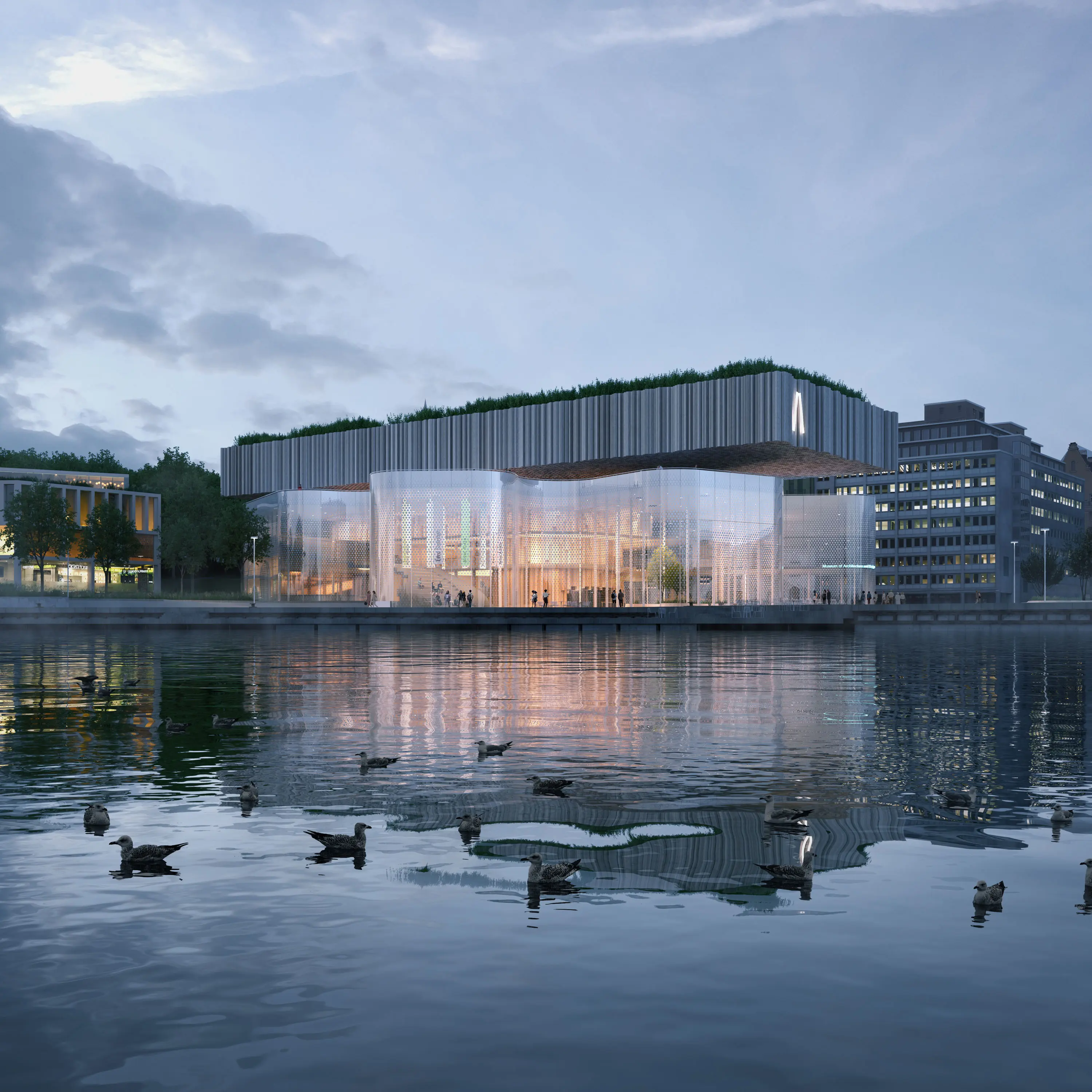 The Meltsinki museum seen from the water at dusk, with its perforated base and green-roofed timber volume above.