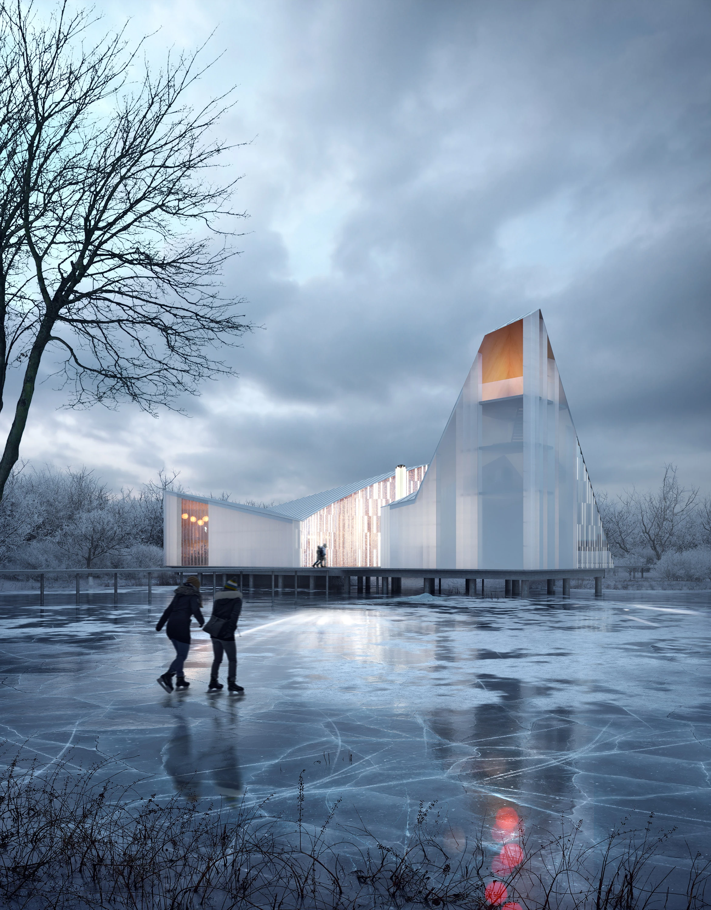 Illuminated pavilion in a snowy public space at dusk.